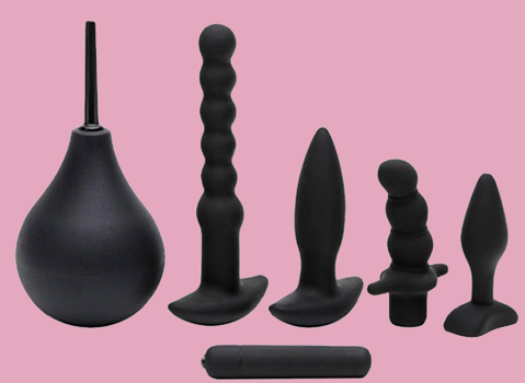 A lovehoney Booty Bumper Bundle kit in black, including an anal douche, anal beads and an anal plug