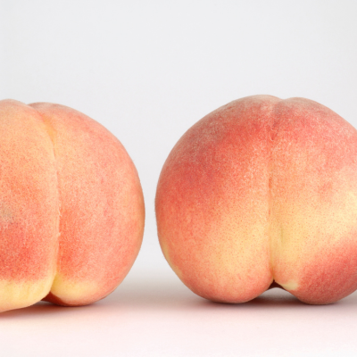 Close up of two peaches