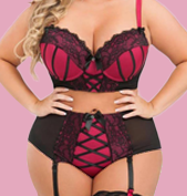 A model wearing a pink and black Lovehoney Boudoir Belle bra set